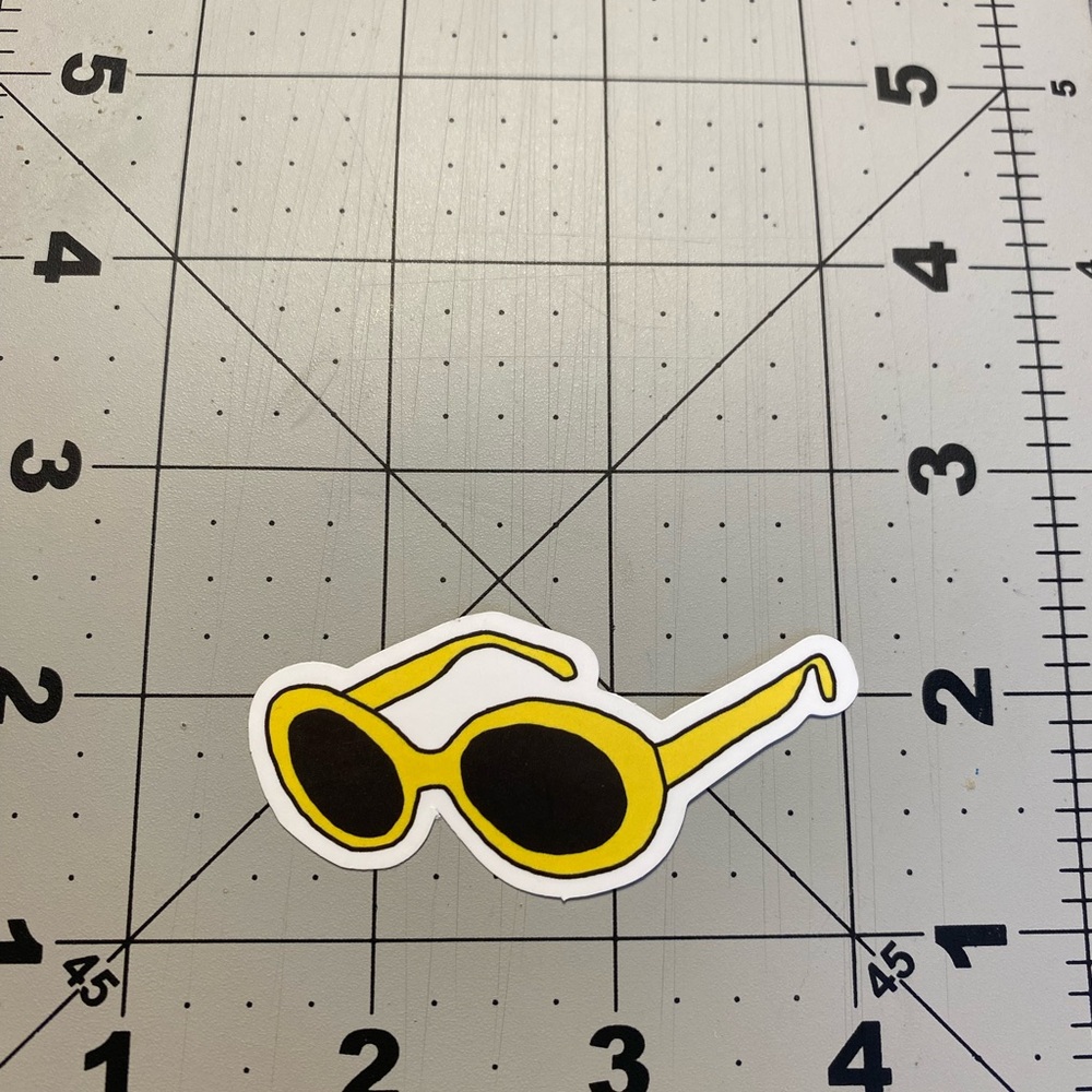 π20/$12π Yellow Sunglasses Sticker - Picture 2 of 3